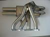 Full exhaust system in stainless steel. Diameter of exit pipes: 61mm. Sold as matched set not separable. Weight 7,5kgs.